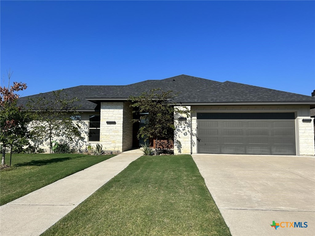 6426 Clayton Court Temple, TX 76502 - Photo 1 of 34 a front view of a house with a yard
