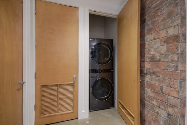 a view of a balcony with a dishwasher and a stove