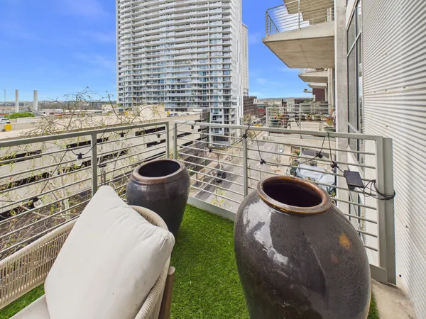 a view of a balcony with city view