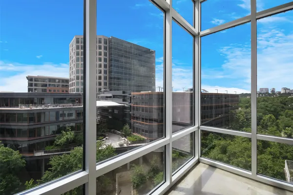 a view of a building with a garden