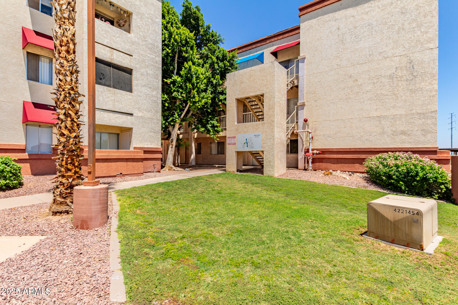 12123 West Bell Road, Unit 138 Surprise, AZ 85378 - Photo 2 of 28 a view of a back yard of the house