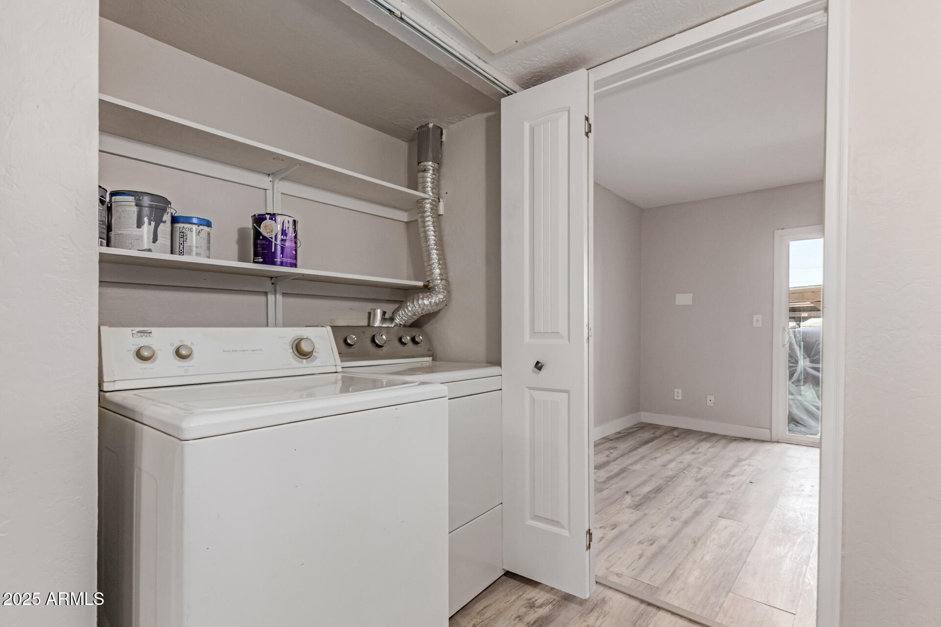 12123 West Bell Road, Unit 138 Surprise, AZ 85378 - Photo 23 of 28 a utility room with dryer and washer