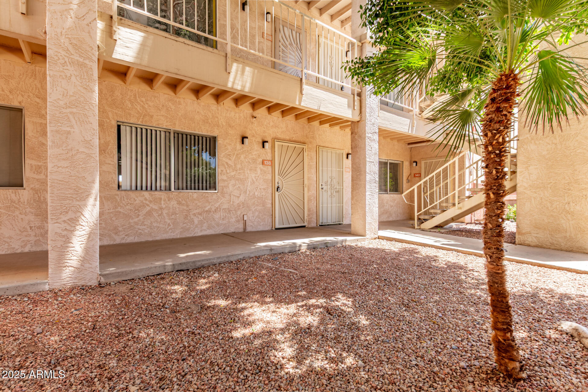 12123 West Bell Road, Unit 138 Surprise, AZ 85378 - Photo 3 of 28 a view of a house with a street