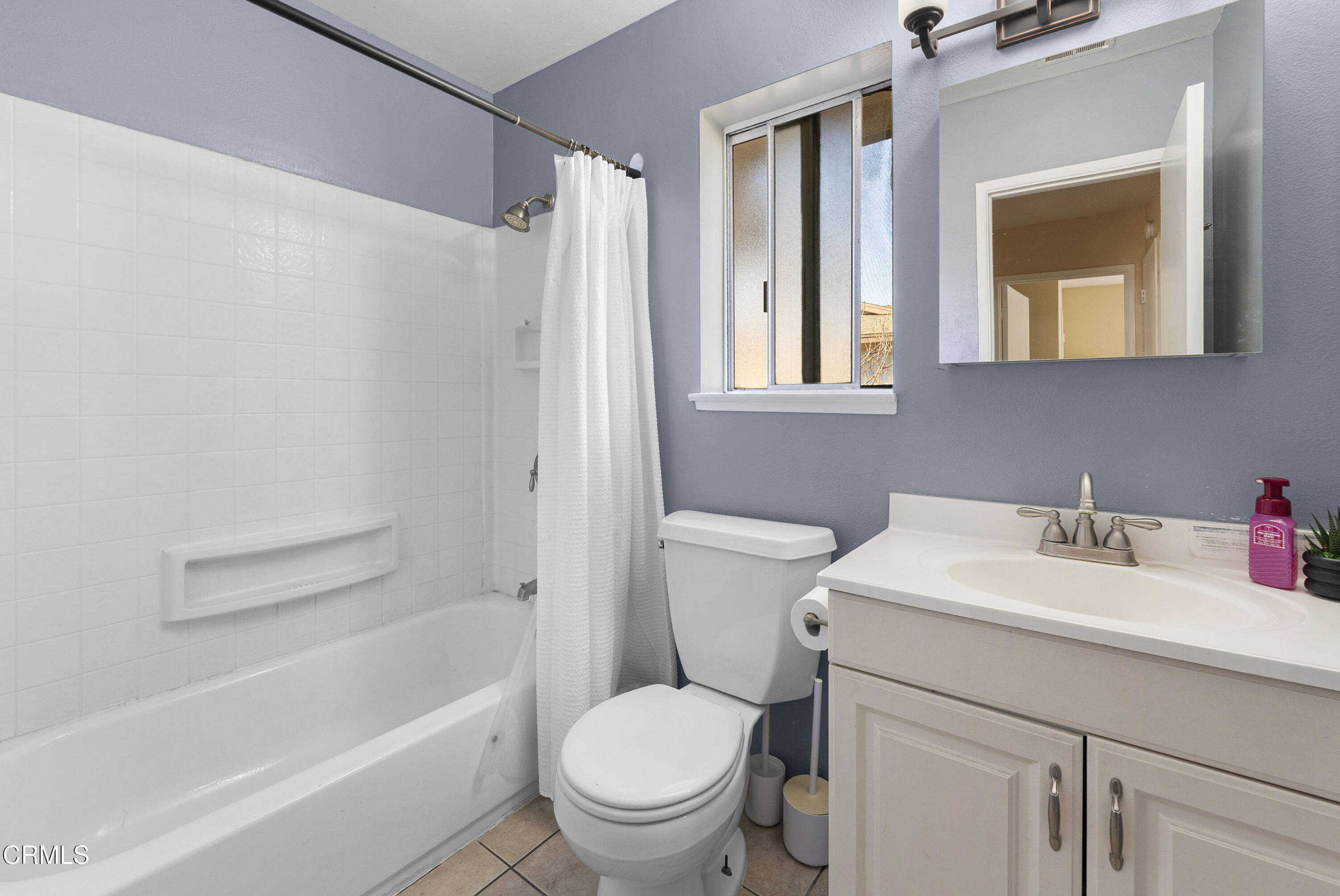 1012 Cheyenne Way Oxnard, CA 93033 - Photo 11 of 16 a bathroom with a sink toilet and shower