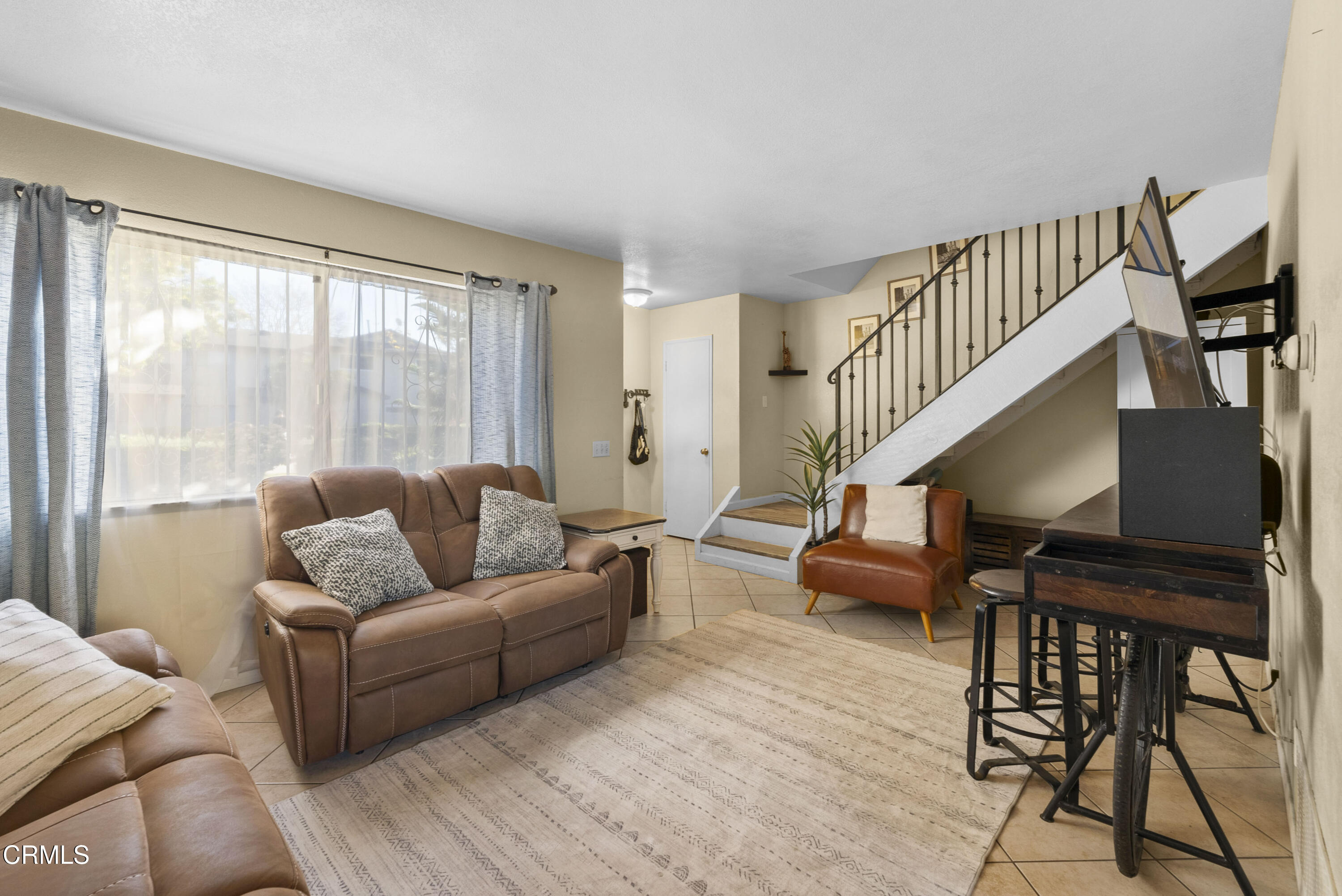 1012 Cheyenne Way Oxnard, CA 93033 - Photo 4 of 16 a living room with furniture and a wooden floor