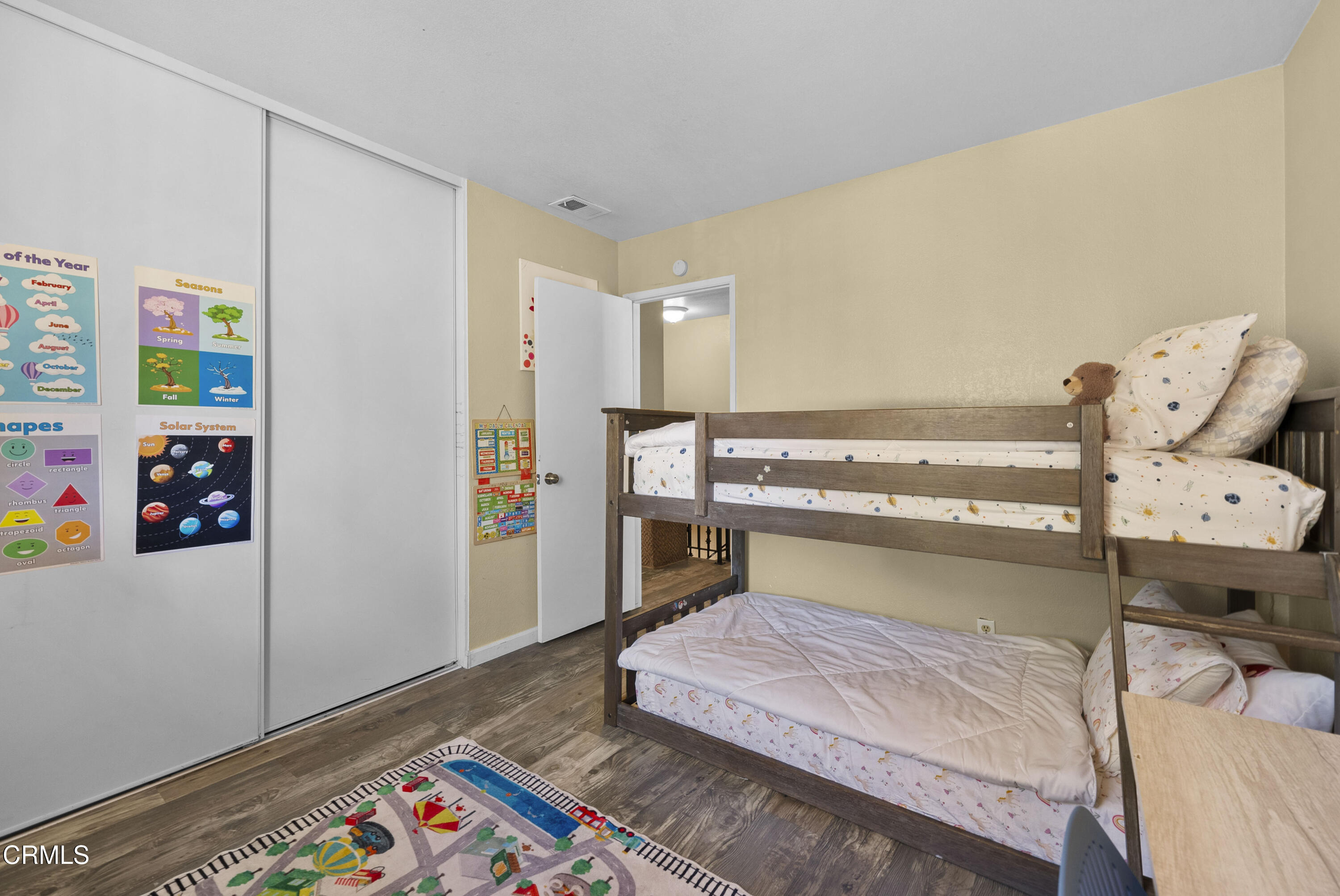 1012 Cheyenne Way Oxnard, CA 93033 - Photo 10 of 16 a bedroom with a bed and a dresser in it