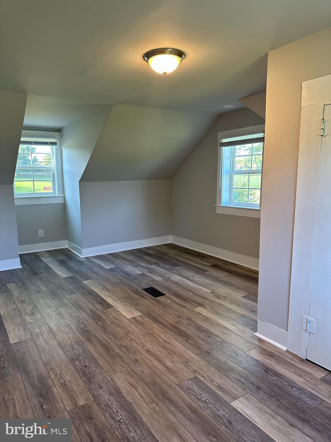 16142 Brandy Road Culpeper, VA 22701 - Photo 17 of 21 an empty room with wooden floor and windows