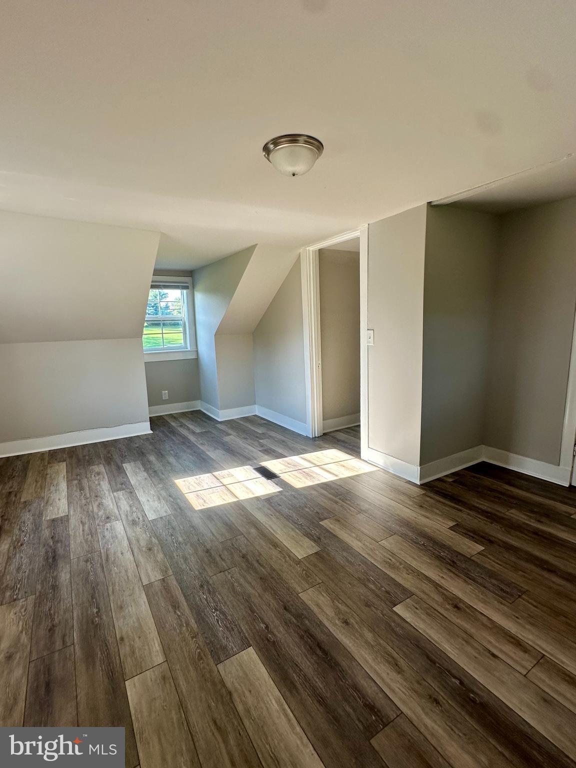 16142 Brandy Road Culpeper, VA 22701 - Photo 18 of 21 wooden floor in an empty room with a window