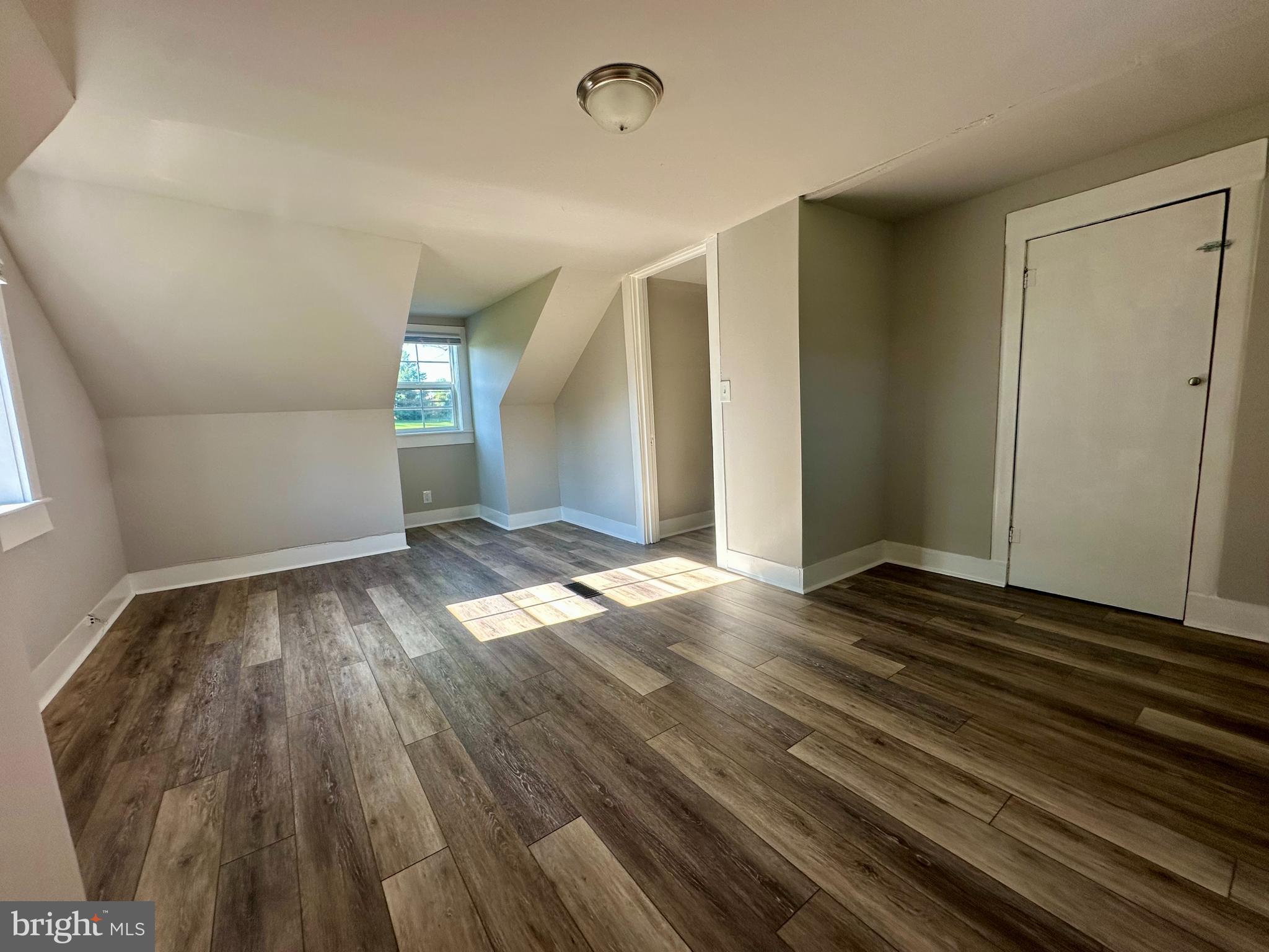16142 Brandy Road Culpeper, VA 22701 - Photo 20 of 21 an empty room with wooden floor and windows