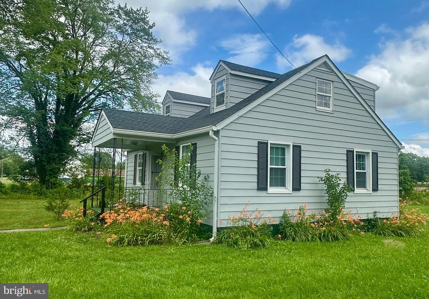 16142 Brandy Road Culpeper, VA 22701 - Photo 2 of 21 a view of a house with garden and plants