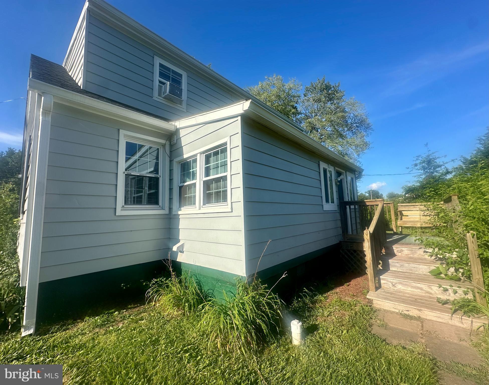 16142 Brandy Road Culpeper, VA 22701 - Photo 7 of 21 a view of a small house with a yard