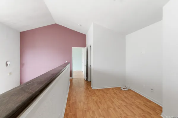 a view of hallway with stairs