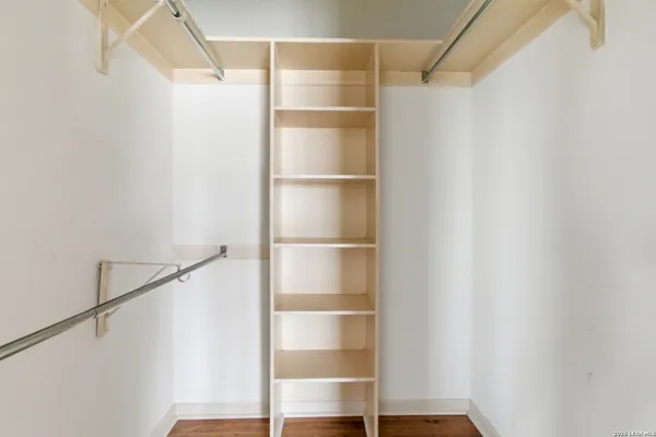 a view of an empty walk in closet