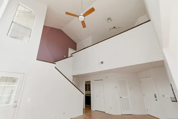 a view of a hallway view with staircase