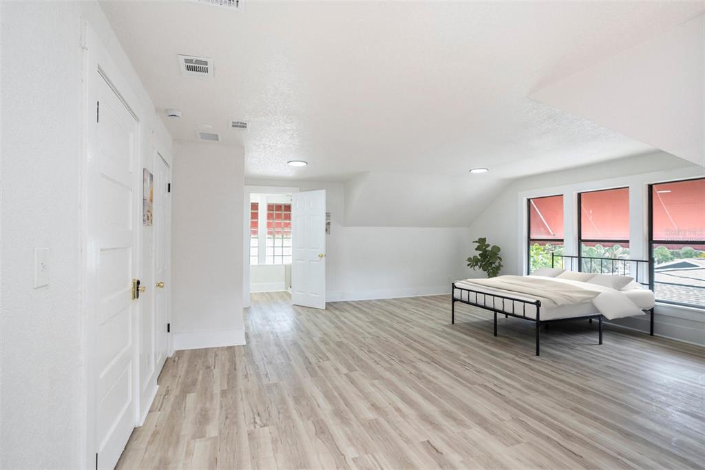 11630 79th Avenue Seminole, FL 33772 - Photo 6 of 14 a living room with furniture and wooden floor