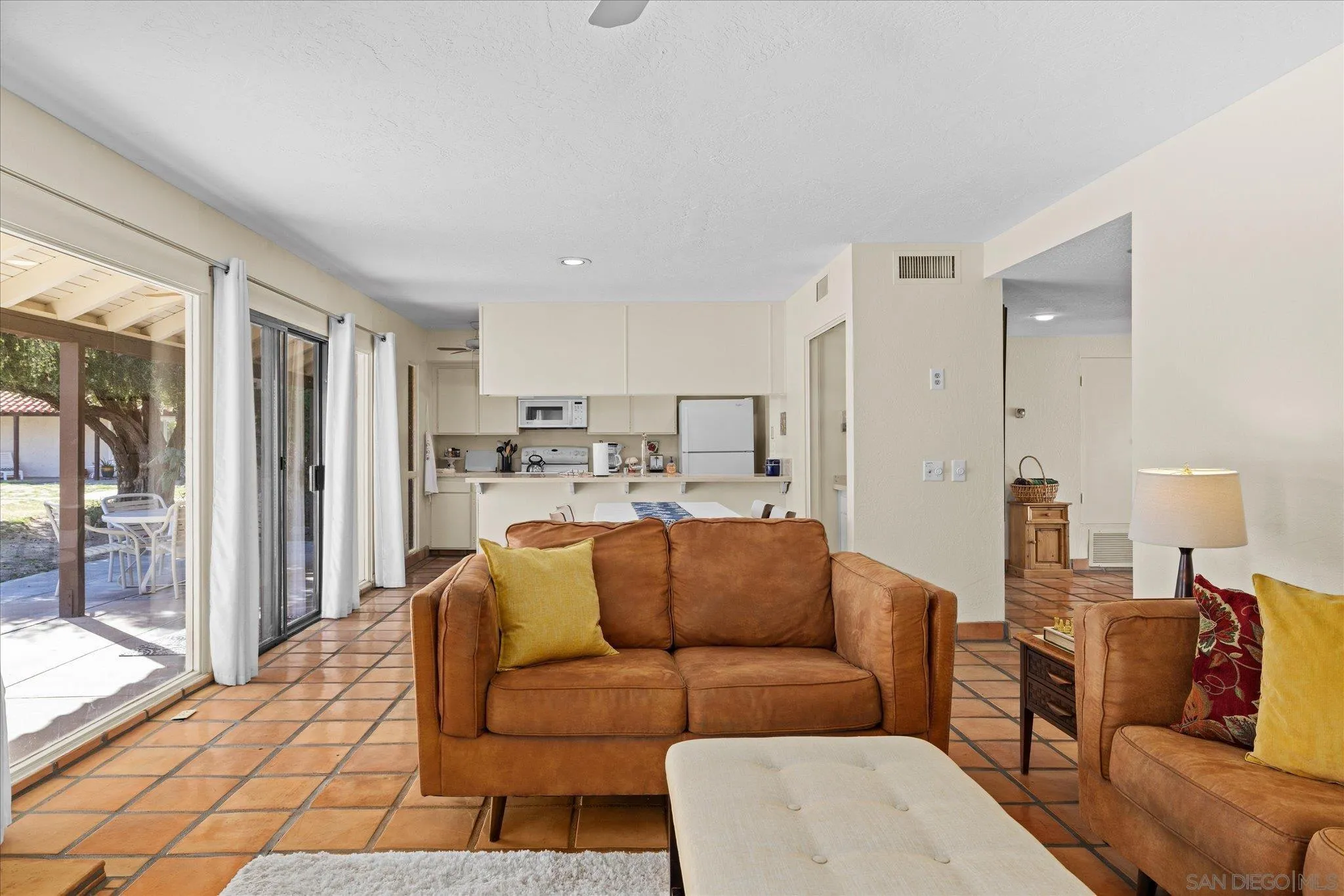 1668 Montezuma Court, Unit 22 Borrego Springs, CA 92004 - Photo 16 of 75 a living room with furniture and a large window