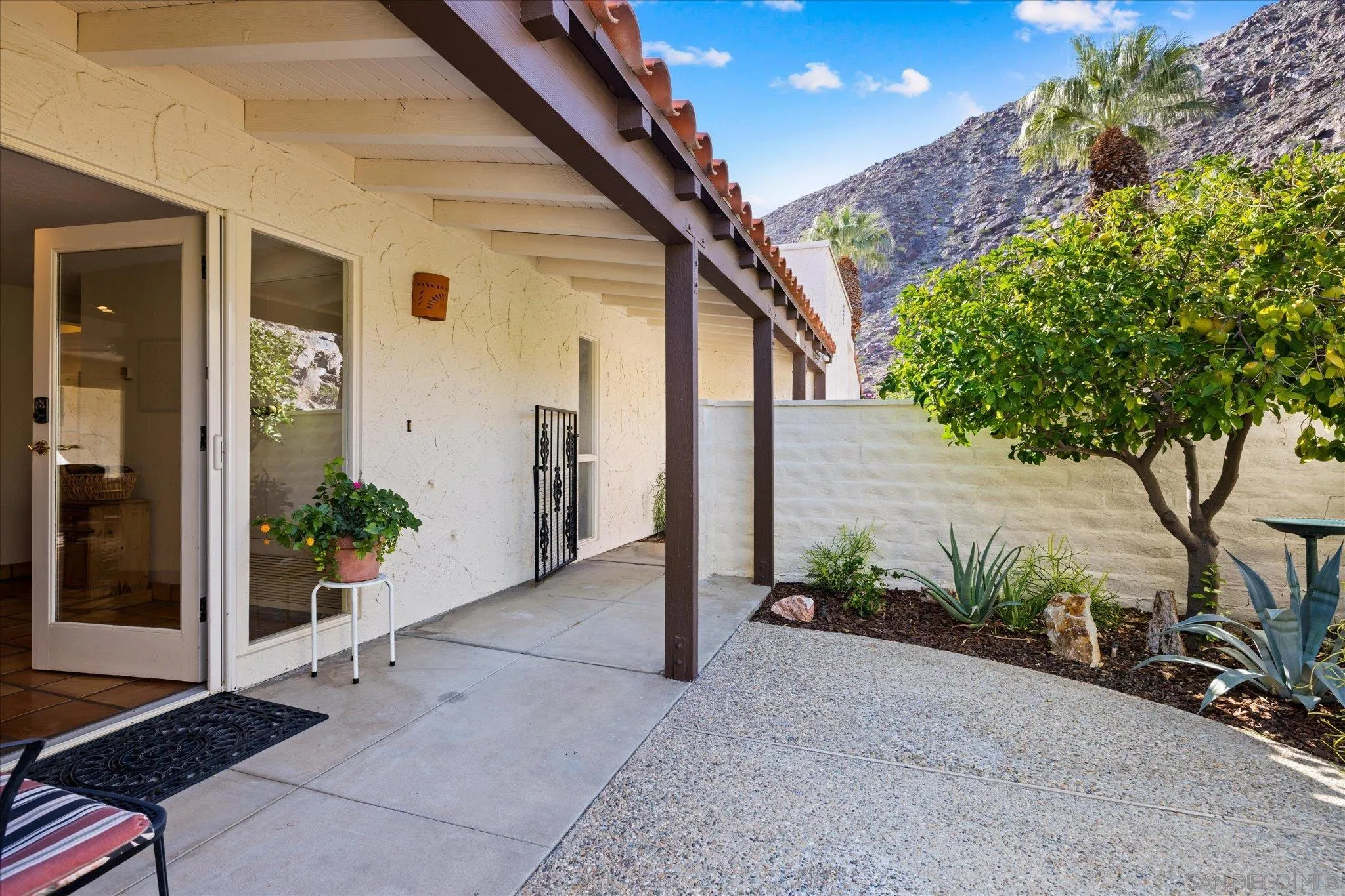 1668 Montezuma Court, Unit 22 Borrego Springs, CA 92004 - Photo 28 of 75 a view of a house with backyard and garden