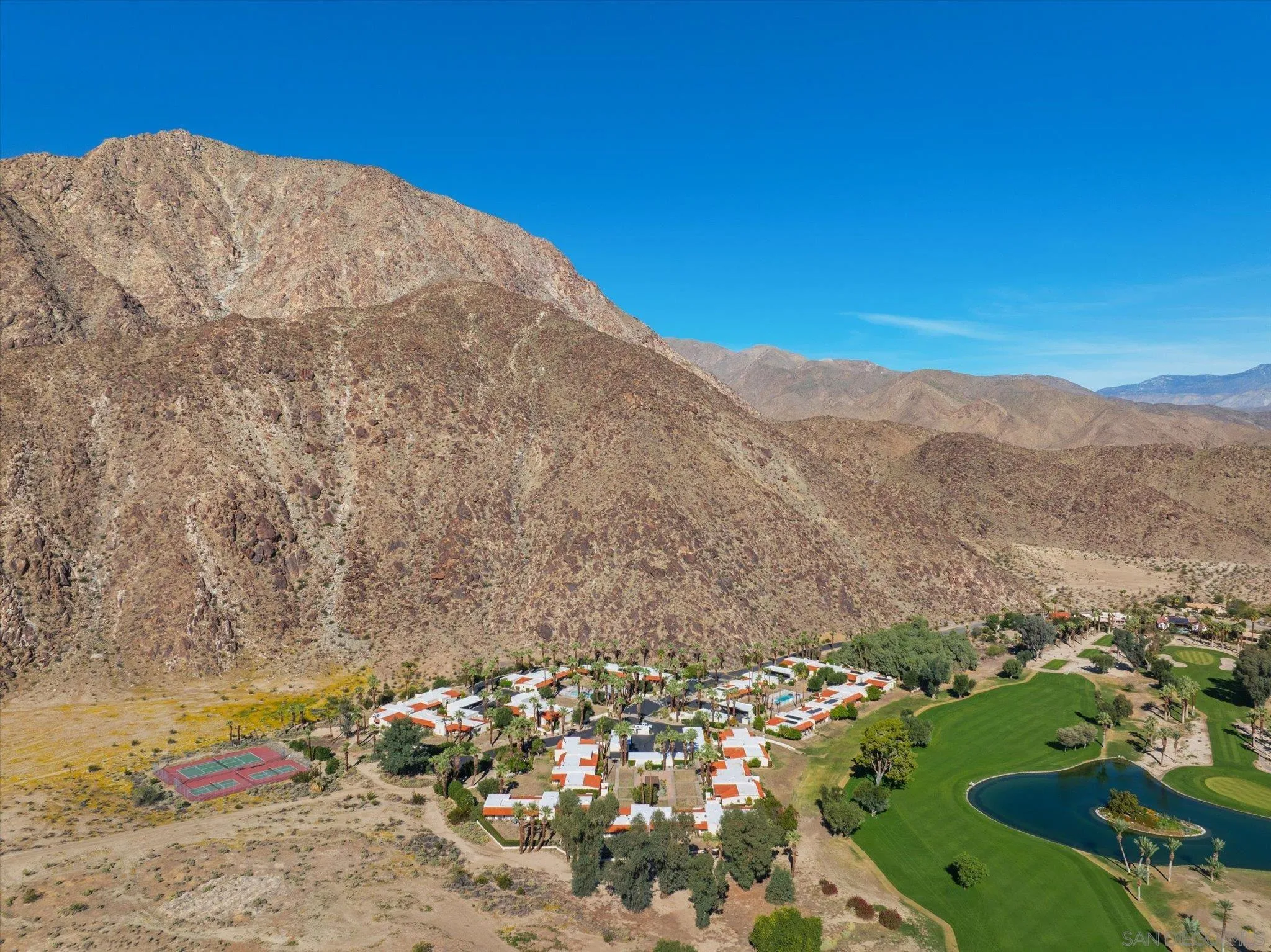 1668 Montezuma Court, Unit 22 Borrego Springs, CA 92004 - Photo 55 of 75 a view of a field with mountains in the background
