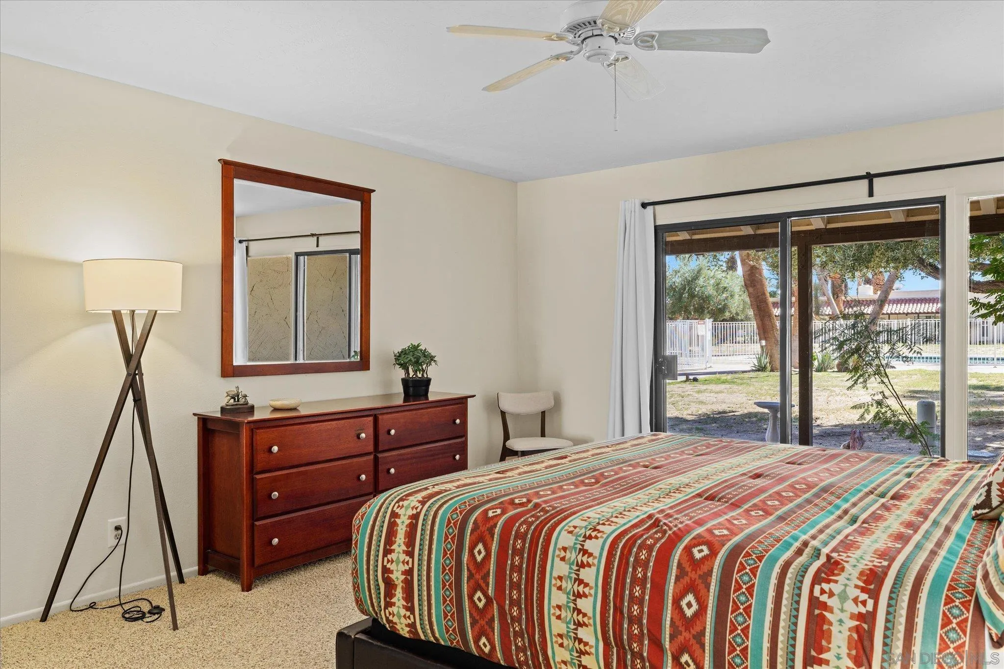 1668 Montezuma Court, Unit 22 Borrego Springs, CA 92004 - Photo 6 of 75 a bedroom with a bed and a mirror