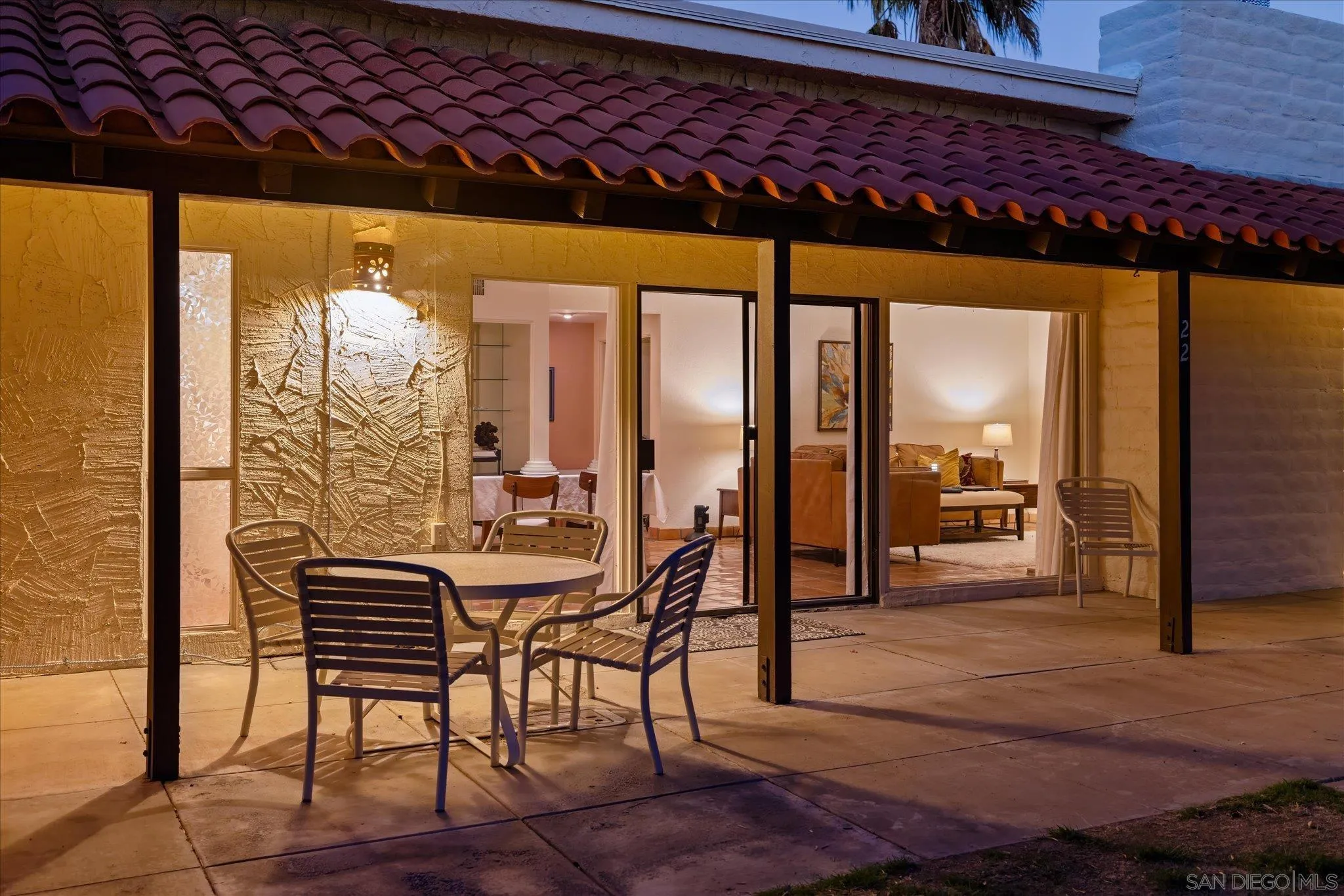 1668 Montezuma Court, Unit 22 Borrego Springs, CA 92004 - Photo 63 of 75 a dining room with furniture and a floor to ceiling window