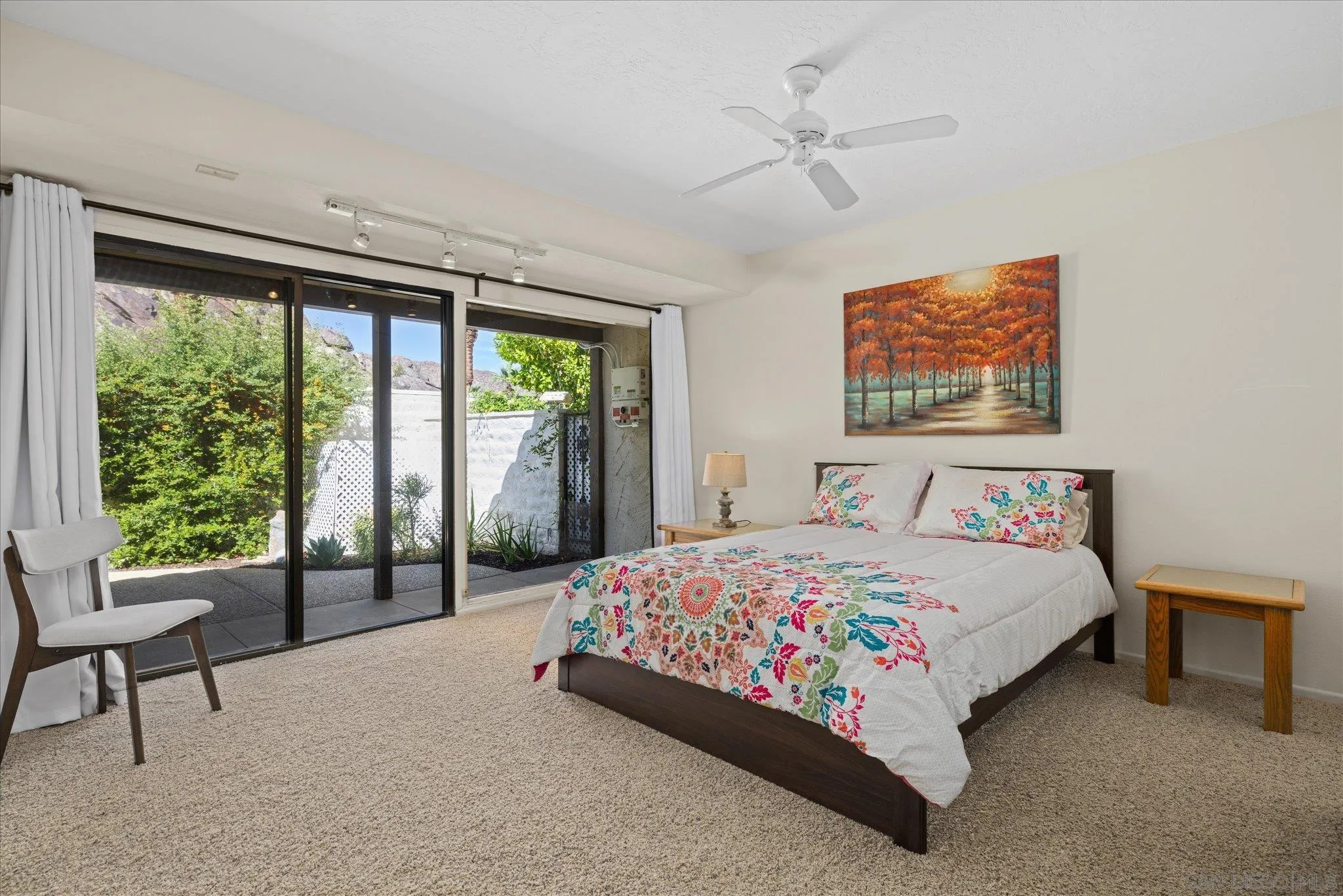 1668 Montezuma Court, Unit 22 Borrego Springs, CA 92004 - Photo 8 of 75 a bedroom with a bed and a large window