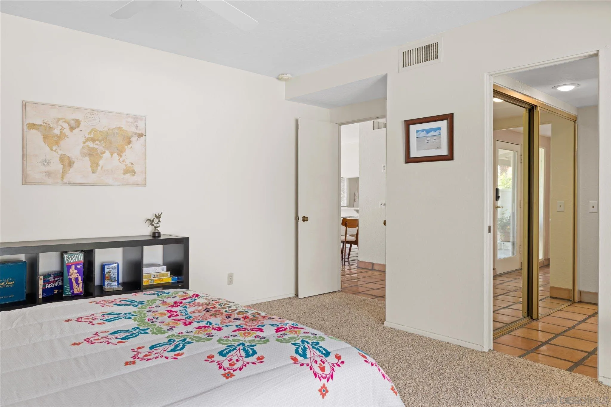 1668 Montezuma Court, Unit 22 Borrego Springs, CA 92004 - Photo 10 of 75 a bedroom with a bed and a book shelf