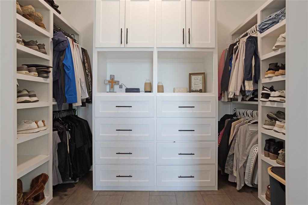 1095 Sister Grove Road Van Alstyne, TX 75495 - Photo 19 of 35 The primary closet has custom built-ins