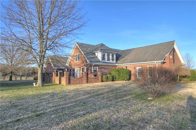 3334 Armstrong Valley Road Murfreesboro, TN 37128 - Photo 18 of 19 a front view of a house with a yard