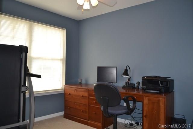 310 Tinder Box Lane, Unit 310 Fort Mill, SC 29708 - Photo 11 of 19 a view of workspace with wooden floor windows
