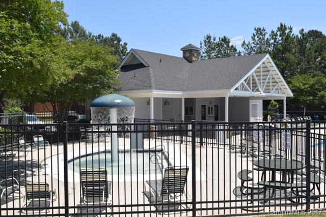 310 Tinder Box Lane, Unit 310 Fort Mill, SC 29708 - Photo 19 of 19 a front view of a house with a garden