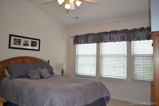 310 Tinder Box Lane, Unit 310 Fort Mill, SC 29708 - Photo 9 of 19 a bedroom with a bed and a window