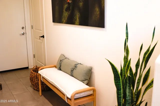 a bedroom with a bed and a view of bathroom