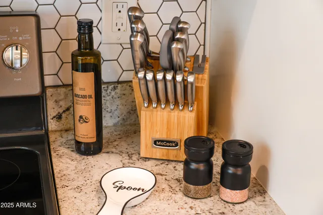 a bathroom with a toilet and shower curtain