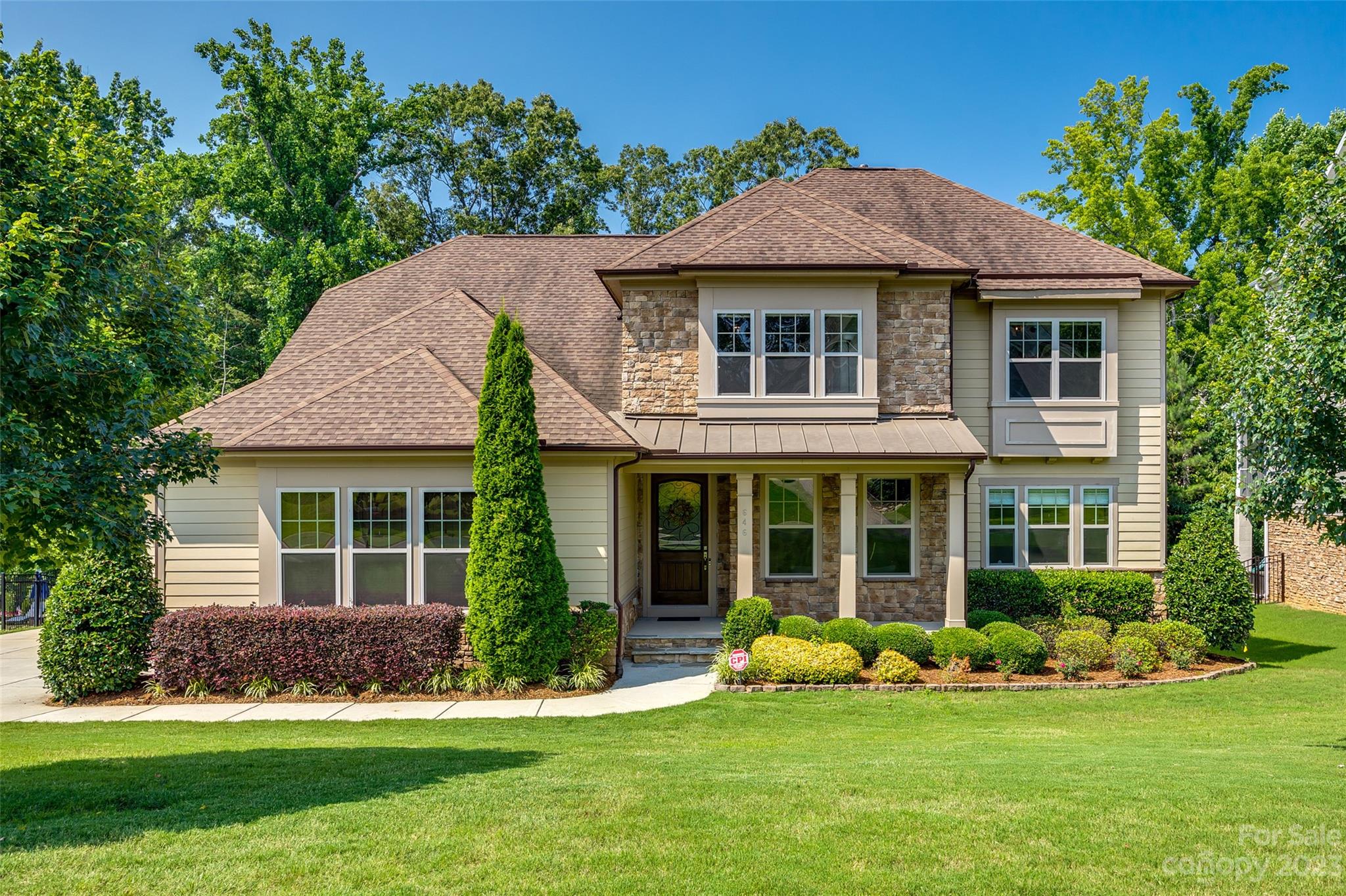 646 Chase Court Fort Mill, SC 29708 - Photo 4 of 48 a front view of a house with a yard and green space