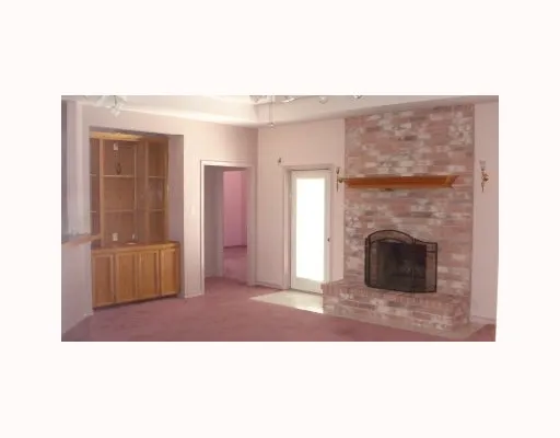 a black and white photo of a living room