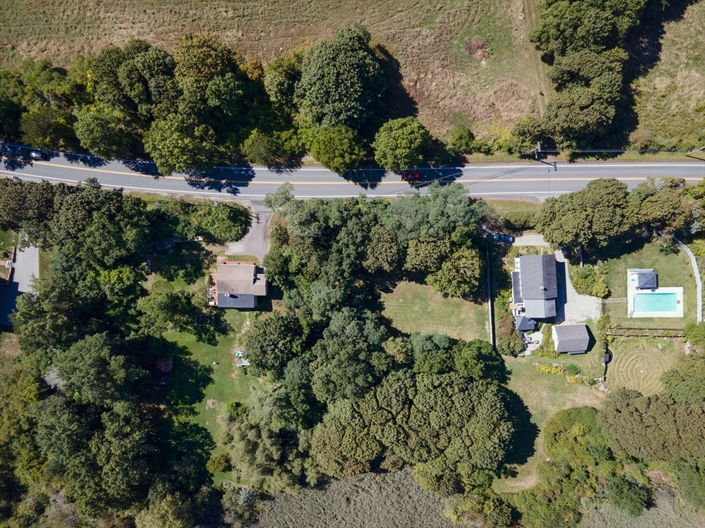 23 Jeffrey's Neck Road Ipswich, MA 01938 - Photo 2 of 10 an aerial view of residential house with outdoor space