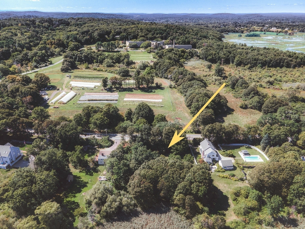23 Jeffrey's Neck Road Ipswich, MA 01938 - Photo 4 of 12 an aerial view of residential house and lake view
