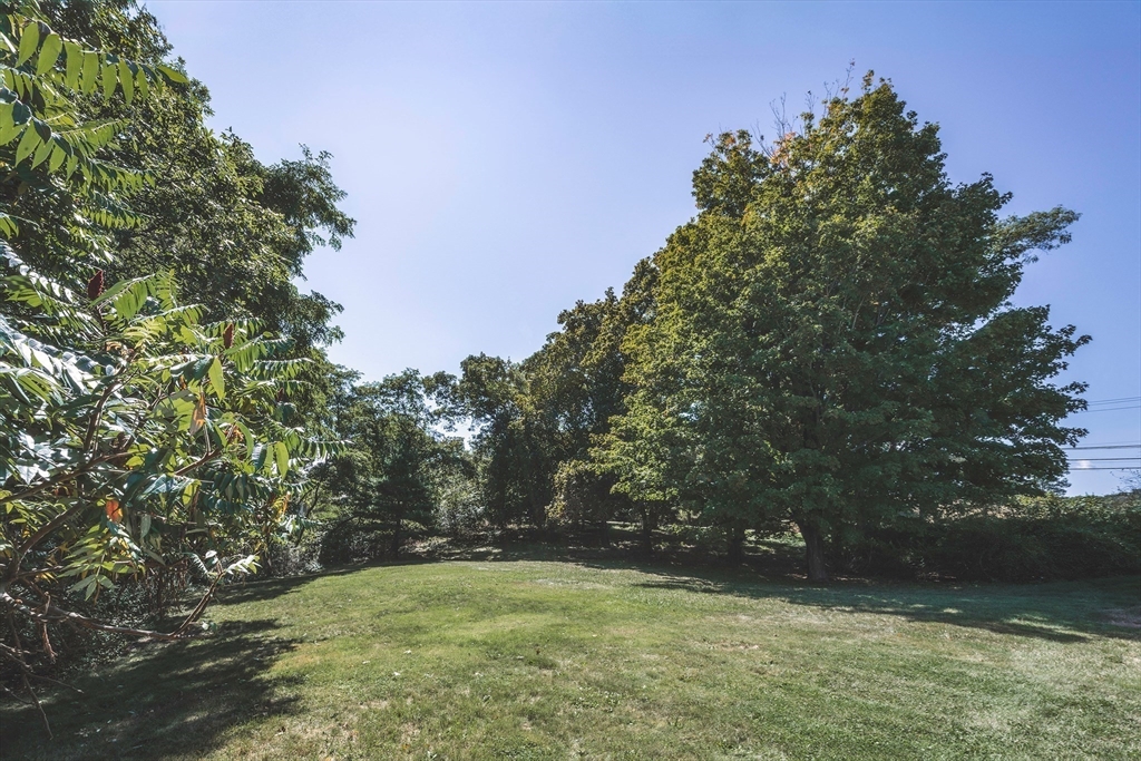 23 Jeffrey's Neck Road Ipswich, MA 01938 - Photo 6 of 12 a view of an outdoor space and a yard