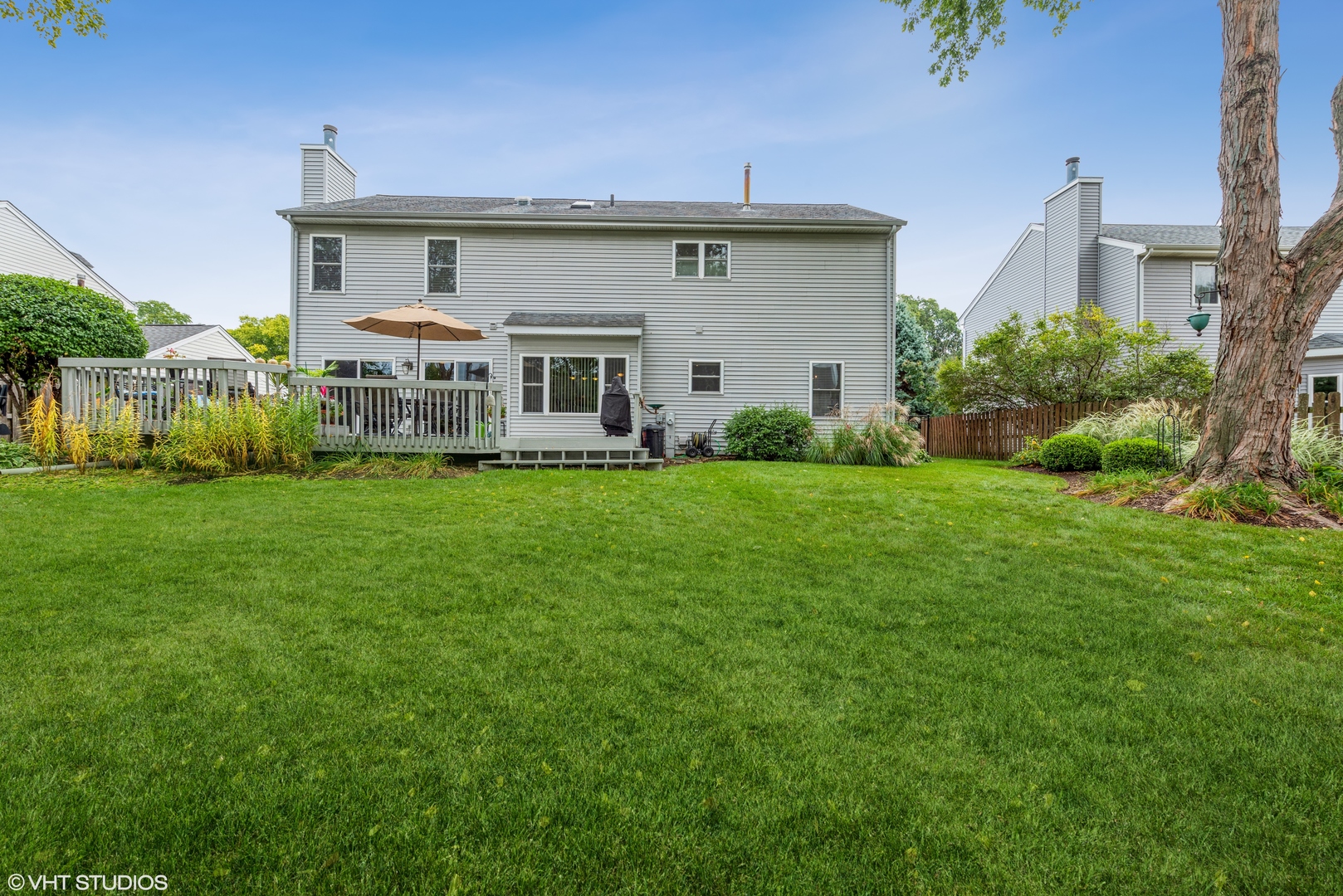 Undisclosed Address Algonquin, IL 60102 - Photo 26 of 40 a view of a house with a yard and plants