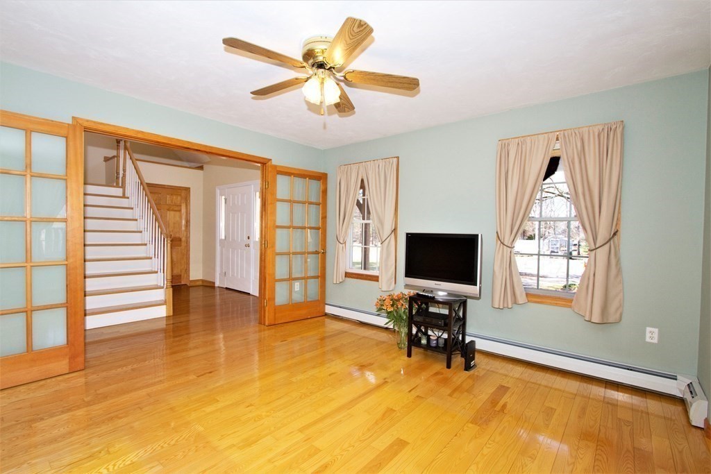22 Edgemere Road North Reading, MA 01864 - Photo 12 of 42 a view of a livingroom with workspace and a window