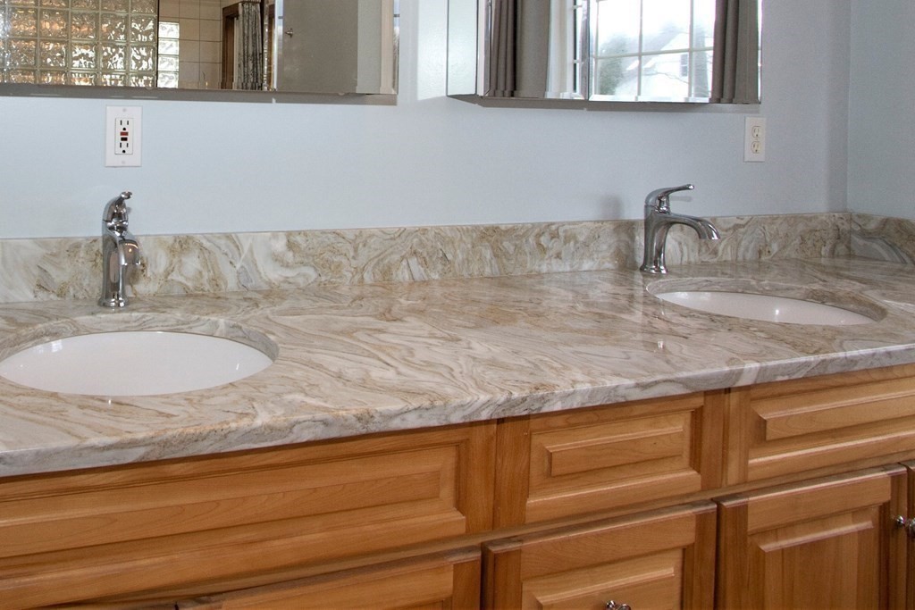 22 Edgemere Road North Reading, MA 01864 - Photo 17 of 42 a bathroom with sink and mirror
