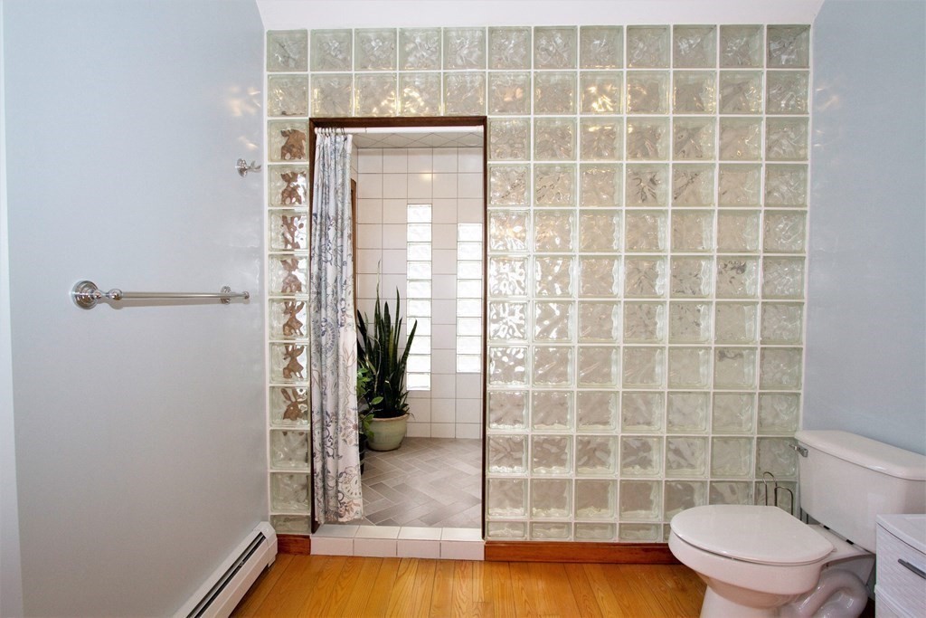 22 Edgemere Road North Reading, MA 01864 - Photo 18 of 42 a bathroom with a toilet and a shower