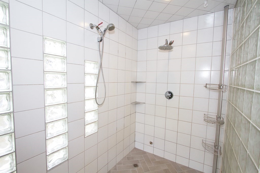 22 Edgemere Road North Reading, MA 01864 - Photo 19 of 42 a bathroom with a shower