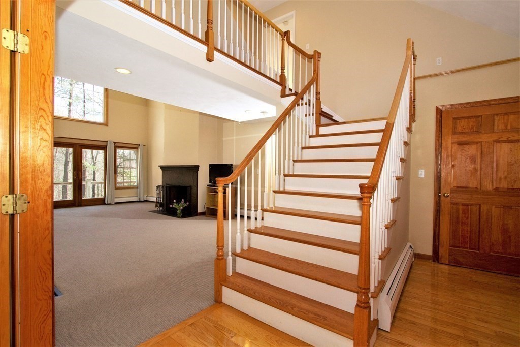 22 Edgemere Road North Reading, MA 01864 - Photo 20 of 42 a view of entryway and hall with wooden floor