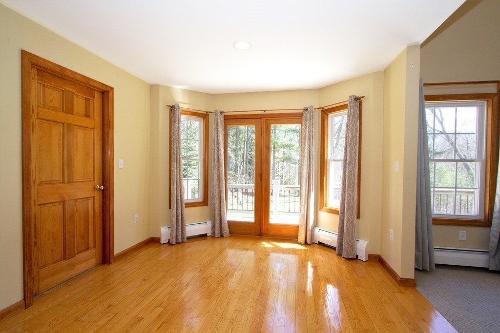 22 Edgemere Road North Reading, MA 01864 - Photo 2 of 42 a view of an empty room with a window