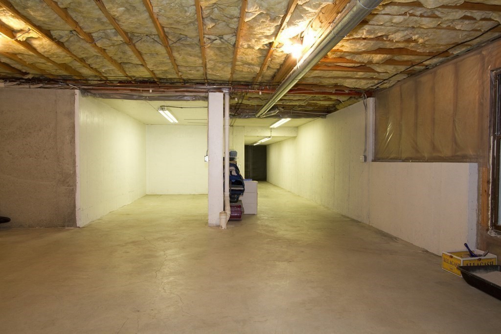 22 Edgemere Road North Reading, MA 01864 - Photo 30 of 42 a view of a room with gym equipment