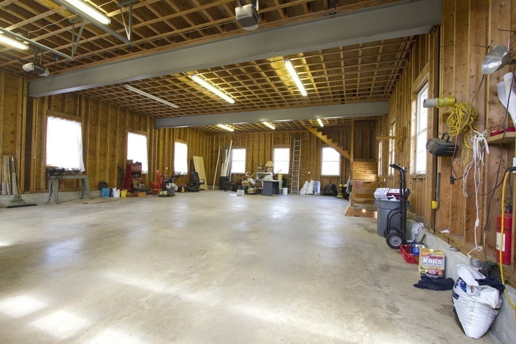 22 Edgemere Road North Reading, MA 01864 - Photo 36 of 42 a view of a room with gym equipment
