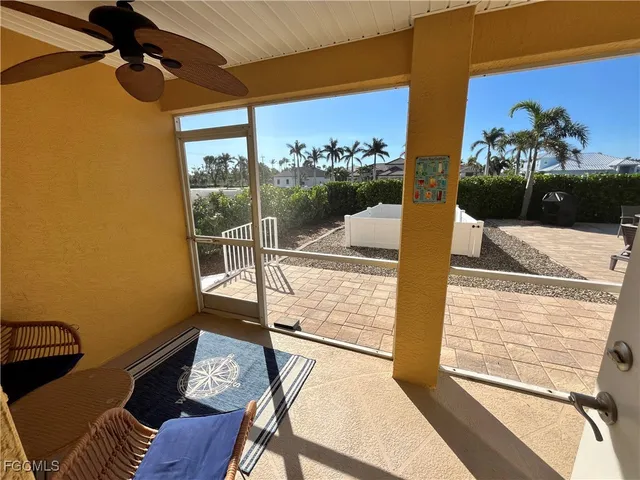 a view of a living room and a window