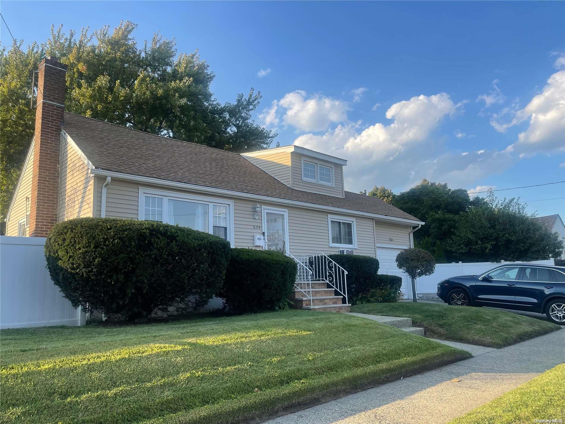 a view of a house with a garden