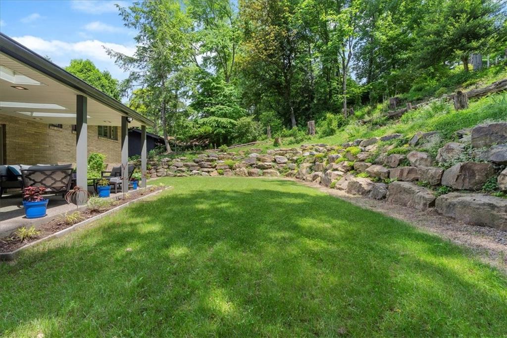 2306 Marbury Road Pittsburgh, PA 15221 - Photo 9 of 39 New rock retaining wall